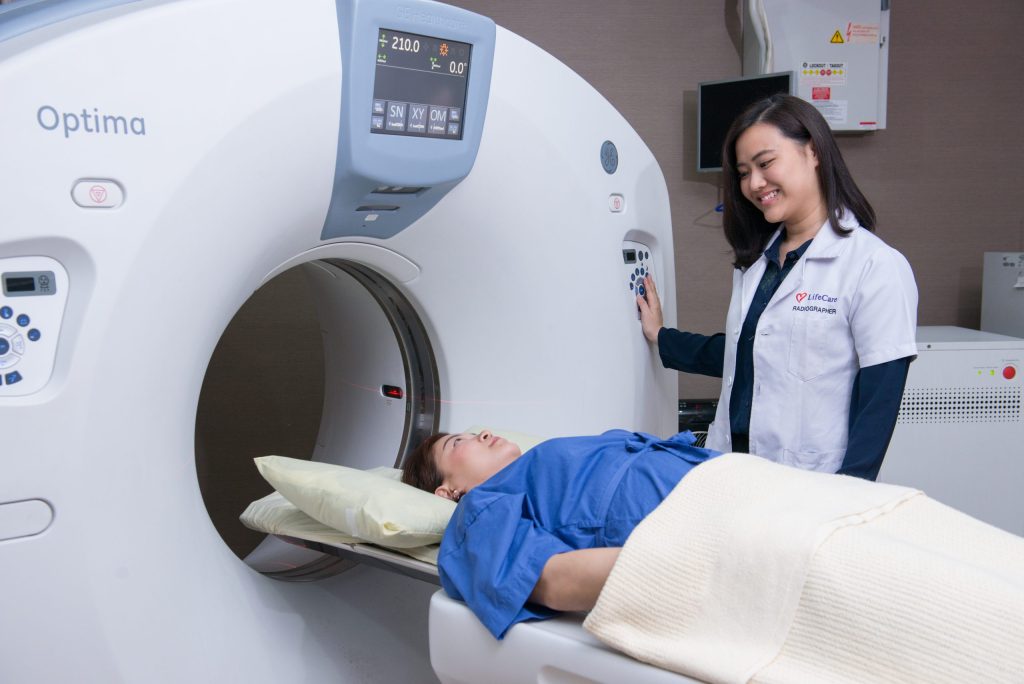 a patient waiting for ct scan with a doctor